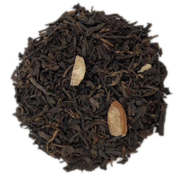 A top-down image of Scottish Caramel black tea with visible almond pieces among the dry leaves.
